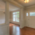 Foyer with columns and kneewalls